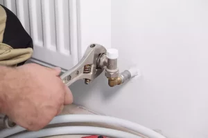 Peut-on changer un robinet de radiateur en chauffage collectif sans prévenir personne ?